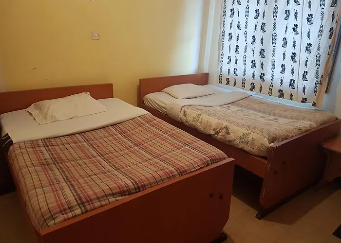 Habitación con 2 Camas Individuales